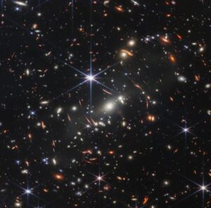 James D'Arcy Instagram - If you held a single grain of sand at arms length up towards the sky and then used the James Webb telescope to look at that minuscule space, this is what you’d see! Thousands and thousands of galaxies, each containing hundreds of thousands of stars…
This is a view of 13 billion years ago, the closest we’ve ever got to the beginning of the Universe. Amazing! I cannot wait to see what this incredible telescope sees next.