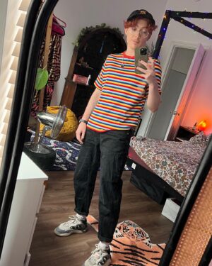 Jamie Hensley-Davies Instagram - some summer ‘fits :}
i guess core vibe is chaotic playful masc :P

(Jamie’s top tips: make running more fun by wearing a bandana and sunnies, and pretending you’re in an 80s movie training montage >:D)

#ootd #transmasc #transguy #transjoy