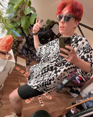 Jamie Hensley-Davies Instagram - some summer ‘fits :}
i guess core vibe is chaotic playful masc :P

(Jamie’s top tips: make running more fun by wearing a bandana and sunnies, and pretending you’re in an 80s movie training montage >:D)

#ootd #transmasc #transguy #transjoy