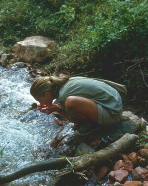 Jane Goodall Instagram - 🌞💧 Your gentle reminder to stay hydrated in the summer heat!
 
Here's a throwback to 1962, featuring a young Dr. Jane Goodall drinking from a stream in Gombe — the site of her groundbreaking chimpanzee observations. (And now home to the longest-running wild chimpanzee study at JGI's Gombe Stream Research Center!)
 
Whether you're exploring the wild or just enjoying your backyard, remember to keep hydrated (with clean drinking water!) and to take care of yourself 💚
 
📷 Hugo van Lawick
 
#StayHydrated #HeatWave #JaneGoodall #JaneGoodallInstitute #Throwback #WildlifeResearch #FreshWater #Outdoors #Hydration
