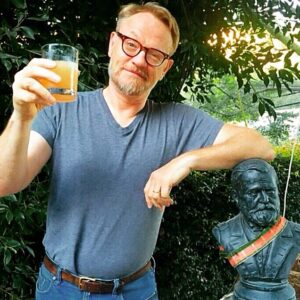 Jared Harris Instagram - Is Flashback Friday still a thing? Because on this day in 2015 the LA City Council declared June 17th officially "Mad Men Day," so as my wife said “you should post more on your IG, damnit,” here's a photo cheering all that in my Lane Pryce specs, with General Grant diligently at my side.  Cheers, all!  Happy Mad Men Day (in LA), and pic (as always) by my dear @allegrariggio ❤️

#TeamHarris
#FlashbackFriday
#FBF
#MadMenDay
#MadMen
#LanePryce
#Hashtag 🤣
