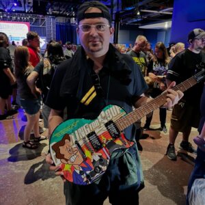 Jaret Reddick Instagram - Thanks Chris for being our first Hangover You Don’t Deserve guitar purchaser! These are for sale at merch. Unfortunately, Chris won’t be able to sign them, but the rest of us will, and we are happy to personalize it for you! Plus we give you a Chris Guitar pick! 
And yes! You can get the jerseys we wear at the merch too!!! 
See yall at the shows!