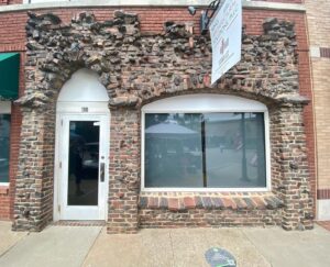 Jelani Cobb Instagram - The bricks in the facade of this building were reclaimed from buildings that were destroyed during the massacre. The black marks are from the century-ago fire that purged the black community of Greenwood from their homes. #tulsamassacre #greenwood