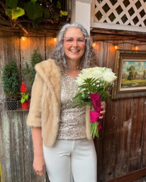Jen Gunter Instagram - I am not sure what happened to the caption but I think everyone figured it out! I married the love of my life @drjenadjacent.

My son did my make up. My best friends were there. My kids were awesome. And I make my own bouquet from Walgreens that day.