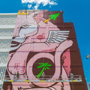 Jeremy Fish Instagram - Done!

I just completed one of the largest paintings in the world's largest mural district here in Wynwood. It took myself and two other painters roughly two weeks, and almost 70 gallons of paint to complete the project. I am very proud of the results.

"ENDANGERED"
54 feet wide x 100 feet tall (each wall)
Acrylic paint on concrete
NW 23rd st. x NW 2nd Ave. 
Miami, Florida
2023

This piece was inspired by the official state animals from where I live, and where I painted this mural. Both the California Grizzly and The Florida Panther became endangered during man's expansion in to their native turf. I thought it was a larger than life way to celebrate these majestic beasts and their struggle with humans. The property owners requested a design that created a connection between San Francisco California and Miami Florida.

I could not have done a piece at this scale without the help and experience from two rad expert type dudes. Infinite gratitude and respect to Daniel Antelo and Guillaume Ollivier for helping me to make these massive beasts come to life.

Thanks again To Jesse Feldman and Glenn Gilmore for trusting me to cover their giant Cube building with all of this paint. 

Big thanks to Harold Ruiz for taking such amazing photos and drone footage of our process on the wall.

Just goes to show that even at almost 50 years old, you can still teach an old dog (fish) new tricks. Grateful to still be experimenting, expanding and exploring the boundaries of my artwork every day. Thanks again to all of my real friends, fans, followers, collaborators and collectors for all of the support over the last few decades to help get me to where I am today.

🏢 @popefeldman 
🎨 @downtowndaniel 
🎨 @funkysquash 
📷 @hdrgraphy