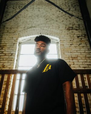 Jerrold Smith II Instagram - From the westside, with love📍Me for @lakers x @lakersstore x @weareround21 🫶🏾 Dropping these here hoping to manifest a game 3 win at home tonight 🥲 and extremely grateful for an opportunity to put on for the home team. Available exclusively in the house that Kobe built!

#lakers #lakersnation #streetwear #streetwearfashion #kobe #lebron