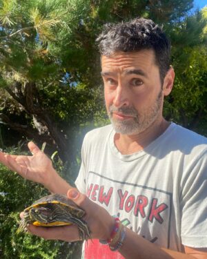 Jesse Bradford Instagram - Ok first a praying mantis and now a turtle. WTF? This red eared slider was just chilling on the road in front of our neighbors house this morning.  I don’t know what’s going on with this menagerie I’m attracting. Better check my horoscope or something…. 
✨🐢✨