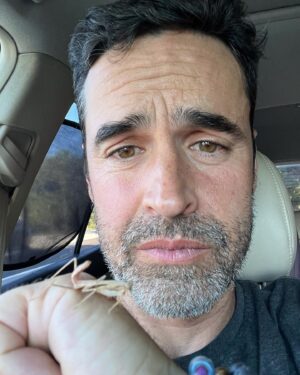 Jesse Bradford Instagram - So we took our daughter to the zoo for the first time yesterday but that’s not even the headline. The headline is I SAVED A PINK PRAYING MANTIS AND THEN SHE WOULDN’T LEAVE MY SIDE FOR 7 HOURS.  She did the whole zoo with us, then lunch, grocery shopping, and even a friends BBQ (my friend, not her friend, I don’t actually know any of her friends). Anyway, she came all the way home with us. The second to last photo is from when I coaxed her into our creosote bush, where she finally seemed ready to get back to her regular life. The last shot is from right after we met 💚