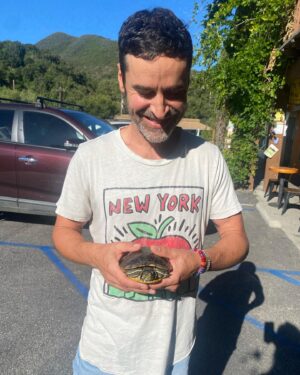 Jesse Bradford Instagram - Ok first a praying mantis and now a turtle. WTF? This red eared slider was just chilling on the road in front of our neighbors house this morning.  I don’t know what’s going on with this menagerie I’m attracting. Better check my horoscope or something…. 
✨🐢✨