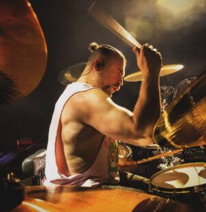 John Dolmayan Instagram - Rocking the pink shirt during our set at @sicknewworld photo compliments of @gregwatermann
