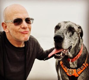 John Heilemann Instagram - Namaste, peeps, and Happy 4th — on which #dzadognyc @gangsteroflovenyc is celebrating his own (physical) independence after 3 restful & rehabilitative but romp-free months following his second successful acl surgery courtesy Dr Pamela Tha God Schwartz at @amcny. And I’ll tell you: He is one *very* exhausted but *very* happy doggo right now. #gangsteroflove #backinthenewyorkgroove #dontcallitacomeback #backinblack 🐶🐾🐾🌊🇺🇸🖤🤍