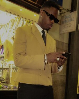 Johnell Young Instagram - “Somebody said I’m dressed like a waiter, guess they meant the way I be serving these looks” 🤷🏾😅