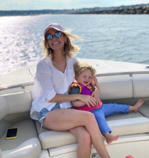 Jon Favreau Instagram - Picked this for the birthday post because it’s got most of @ebfavs’s favorite things: Charlie, her phone, a boat, Maine, and a husband who finally took a picture (@leo_the_dood would’ve completed the package)

Happy Birthday, Em. We love you.