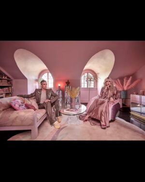 Justin Tranter Instagram - Thank you for coming to tour my house @archdigest !! Me and @moidariandarling dreamed of living in a “Transion” together for many many years. Now it’s happened. Queer dreams come true dammit! Most of the house is serving 1920’s Deco but as you’ll see Darian’s “penthouse” is 1980’s Deco decadence. An intentional drastic shift to gag one and all. Check the link in my bio to see ALL the gorgeous photos by @jennapeffley and read the wonderful article by Rachel Davies. Also! The magical sculpture is by @is_siigii please check out their work.