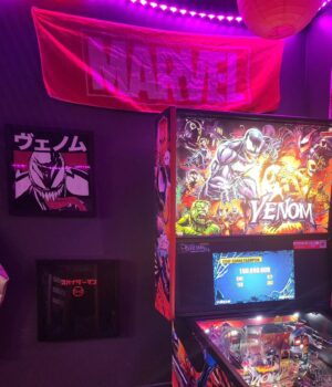 Justin Warner Instagram - People think I'm a hoarder, and maybe I am, but when @sternpinball sends #venompinball to my ramen shop, I can produce a @marvel tengui, and two @marvelstyle_jp tshirts to make a micro nerd-cave to celebrate my favorite symbiote.