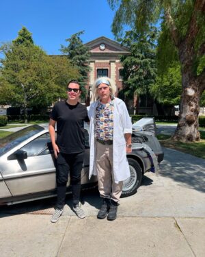 Justin Willits Instagram - Great Scott!! 
There’s no video of it; but got to spend a few hours wandering around on a golf cart the other day and who should we come across but Doc Brown out there greeting glamour trams from @unistudios 

Tyler said we didn’t wanna take up too much of his time, and Doc and I pointed out he has all the time in the world he’s got a time machine 

We very rarely get invited to do anything cool like that so thanks to our friend F for driving us around!