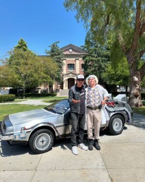 Justin Willits Instagram - Great Scott!! 
There’s no video of it; but got to spend a few hours wandering around on a golf cart the other day and who should we come across but Doc Brown out there greeting glamour trams from @unistudios 

Tyler said we didn’t wanna take up too much of his time, and Doc and I pointed out he has all the time in the world he’s got a time machine 

We very rarely get invited to do anything cool like that so thanks to our friend F for driving us around!