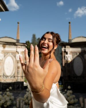 Kalani Hilliker Instagram - A lifetime of this. I couldn’t be lucky enough or more grateful to get to be your fiancé. I love you  forever Nathan🤍🦋

Planner: @audreywoodevents 
Photographer: @romanivanov_photo 
Flowers: @lakecomoflorist 
Ring: @brilliantearth