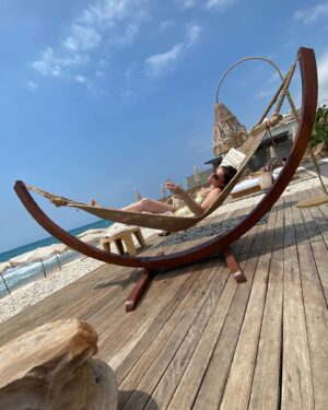 Karolina Muller Instagram - Sipping rosé in my hammock, feeling like a total beach babe! Who else is ready for summer vibes? ☀️ #summervibes #beachlife #roséallday #hammocklife #vacaymode #summervacation #beachday #relaxation #happygirl #beachbumforlife @karolinamullerofficial