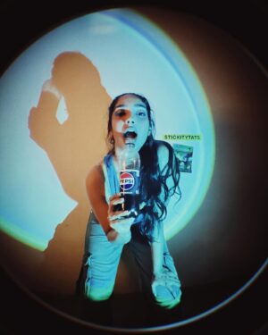 Karthika Muralidharan Instagram - Took an audition for Pepsi too far ❤️‍🔥
F*cked up the shoot dates but are you a millenial if you are not using your misses for content ☄️

Creative Direction and concept by yours truly
Shot and backed up by my creative gangster in partner @luceamma 

We were going for the aesthetic of pepsi ads from back in the cable TV days , when Michael Jackson burned half his head and Britney , Beyonce and Pink were galdiators. The blue, the sparkle , jeans , fish eye , the grain and low af production - Pepsi was for the cool kids because kid shit creativity is cool. 
Backyard production days are truly the most liberating 🦋