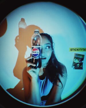 Karthika Muralidharan Instagram - Took an audition for Pepsi too far ❤️‍🔥
F*cked up the shoot dates but are you a millenial if you are not using your misses for content ☄️

Creative Direction and concept by yours truly
Shot and backed up by my creative gangster in partner @luceamma 

We were going for the aesthetic of pepsi ads from back in the cable TV days , when Michael Jackson burned half his head and Britney , Beyonce and Pink were galdiators. The blue, the sparkle , jeans , fish eye , the grain and low af production - Pepsi was for the cool kids because kid shit creativity is cool. 
Backyard production days are truly the most liberating 🦋