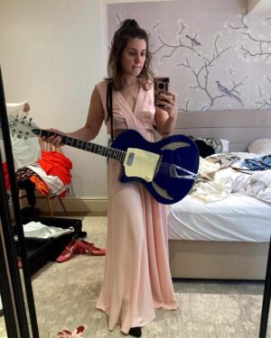 Katie Melua Instagram - Packing for travels and I want the outfits to match the guitar.
Not so easy with a bold azure blue. 
💃🏻😎