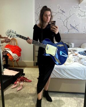 Katie Melua Instagram - Packing for travels and I want the outfits to match the guitar.
Not so easy with a bold azure blue. 
💃🏻😎