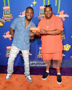 Kel Mitchell Instagram - Mitchell family on the orange carpet at the Kids Choice Awards! 🧡 Wearing denim because it’s timeless, just like our love for Good Burger. Celebrating the fan favorite win for Good Burger 2 is truly special. Thank you to all the fans for the incredible journey! 🍔 #GoodBurger2 #FanFavorite #FamilyLove