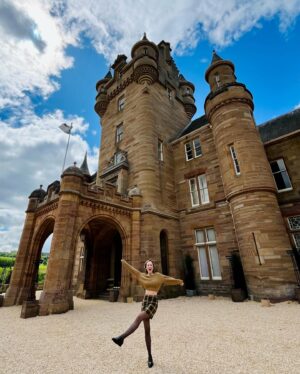 Kelley Jakle Instagram - Scotland pt 2: Portraits BY people I love. Thank you @chrissiefit and @annakendrick for capturing all of my tweed and tartan in front of the most impossibly beautiful backdrops. 🏴󠁧󠁢󠁳󠁣󠁴󠁿 

ft. my mom’s vest that her friend Susan made her in the 70s, my dad’s sweater, Chrissie’s coat, a @baukjen dress from Patience and @hellotefi’s bracelets that gave me the confidence to boy-band-pose.