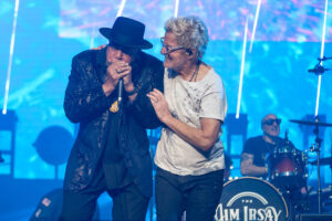 Kevin Cronin Instagram - Hi friends, I am very fortunate that my years with REO Speedwagon have allowed me to be a guest vocalist w/ some amazing “house bands” at various charity events during REO down time. Most recently I joined my friends in the @thejimirsaycollection for another night of good fun & great music at the Shrine Auditorium in LA. 

The mood was a combination of somber & joyful. Somber due to the illness of our leader & benefactor, a man as generous of spirit as with his riches, humble, respectful, and loyal, and a lover of music and everyone involved in creating it, a man I am proud to call a friend, the inimitable Jim Irsay. I wish Jimmy the best as he faces this terribly tough challenge, and I have faith that he will come through it stronger than ever. 

Jim wanted the concert to go on, with or without him, and we all dedicated every note we played and sang to his recovery. I was honored to be among the guest singers that night, all giants in their own right: Ann Wilson of Heart, Peter Wolfe of the J. Geils Band, and Billy Gibbons of ZZ Top. I think you can feel my joy in these photos from my performance, as this amazing band lifted me up and put their masterful imprint on my songs. 

As I write this, the REO boys & I are on a flight from LA to Orlando, for a co-headline show with @styxtheband on Thurs. night. It will be great to see Tommy, JY & the boys, and the great audience our bands attract when we join forces. We will be playing a new & exciting setlist this year, & the band is raring to go. 

The 2024 tour begins on 3/20 in Reading, PA w/ @rickspringfield & lands in Estero, FL w/ @cheaptrick on 4/6. I will be writing about our adventures as our tour winds its way through Charleston, Knoxville, Columbia, Montgomery, St Augustine, & many points in between. You can check reospeedwagon.com for a list of tour dates. We will be announcing a very special summer tour later this month, & are stoked to be sharing the stage w/ an awesome band w/ an amazing lead singer that we have never played with before. So stay tuned! … kc 

Pictured above at the Shrine Auditorium: kc with @kennywayneshepherd, with @bbranch103, and with Tom Vukovich, and doing his “lead singer thing”.