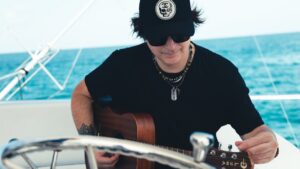 Kevin Rudolf Instagram - Sometimes you have to #loseyourself to find yourself. And I had the pleasure of casting off to sea with Captain Jack of @newmoonsportfishing and the inimitable @kevinrudolf . Kevin gifted us with acoustic renditions of #imadeit and #letitrock all while the sun was shining and my camera was rolling. The music just hit different on Jacks boat than in the studio. It was a very special day and we’re excited to share some key moments with you very soon. #KevinRudolf #RockGuitarist #AcousticSessions #MiamiMusicScene #BoatJam #MusicOnWater #LiveMusicMiami #GuitarOnTheGo #MiamiVibes #BoatConcert #RockingTheBoat #MusicalEscape #SunsetJamming #MiamiMusicians #GuitaristLife #MusicianOnBoard #BoatLife #JammingInMiami #LiveMusicExperience #AcousticVibes
#newmoonsportfishing