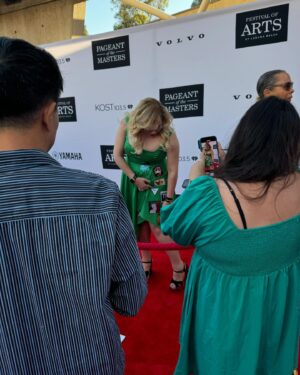 Kirsten Vangsness Instagram - I love this dress I made up so much she gets her own post. @kimberlyfreed found the green dress, I have been searching for the most worthy of places to put those patches, and suddenly this dress seemed like the place. I didn’t have time to sew them on and I trust my sewing skills less than my glueing skills, so glue them on I did. I will eventually have to cut them off this dress and put them on something else because I need to be wearing a patch of a squirrel playing drums more than once a year, obviously. When I first thought of the idea like most of my fashion choices, I got a little scared, but I knew it would look good to me and it’s fun to be proud of something that I was a part of the creation- this is your sign to glue something on some clothes or take some scissors to a T-shirt or find a shoelace you love and tie it around one of the sleeves of your shirt.