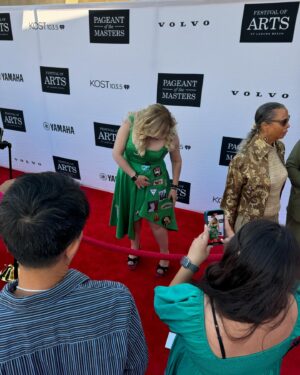 Kirsten Vangsness Instagram - I love this dress I made up so much she gets her own post. @kimberlyfreed found the green dress, I have been searching for the most worthy of places to put those patches, and suddenly this dress seemed like the place. I didn’t have time to sew them on and I trust my sewing skills less than my glueing skills, so glue them on I did. I will eventually have to cut them off this dress and put them on something else because I need to be wearing a patch of a squirrel playing drums more than once a year, obviously. When I first thought of the idea like most of my fashion choices, I got a little scared, but I knew it would look good to me and it’s fun to be proud of something that I was a part of the creation- this is your sign to glue something on some clothes or take some scissors to a T-shirt or find a shoelace you love and tie it around one of the sleeves of your shirt.