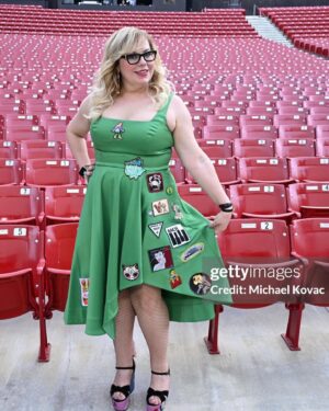 Kirsten Vangsness Instagram - I love this dress I made up so much she gets her own post. @kimberlyfreed found the green dress, I have been searching for the most worthy of places to put those patches, and suddenly this dress seemed like the place. I didn’t have time to sew them on and I trust my sewing skills less than my glueing skills, so glue them on I did. I will eventually have to cut them off this dress and put them on something else because I need to be wearing a patch of a squirrel playing drums more than once a year, obviously. When I first thought of the idea like most of my fashion choices, I got a little scared, but I knew it would look good to me and it’s fun to be proud of something that I was a part of the creation- this is your sign to glue something on some clothes or take some scissors to a T-shirt or find a shoelace you love and tie it around one of the sleeves of your shirt.