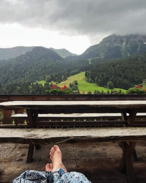 Kirstie Allsopp Instagram - No guests, no one to cook for or entertain, my boys are elsewhere having a ball, as they should be, and I’m building up my strength for the next mountain, the sky is a little grey but the sun will come out tomorrow. 
My life is amazing, and so much of that is due to my work, the people who trusted me to help them find & alter the thing that is most important to them, their home, and all the lovely people who watch Phil & I do what we do.
I am fortunate enough to have a few homes, something I’ve been shy of admitting, but that’s absurd, no one says Elton John or Taylor Swift can’t have more then one home.
So this is one of my favourite views in one of my favourite places 🇨🇭and I am going to be more real, in all sorts of ways going forward. 
PS Thank you for all the lovely comments about my dress in the previous post, yes I do almost everything in a dress 👗