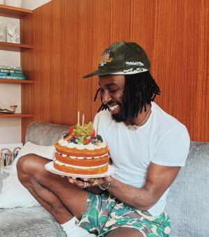 Kojey Radical Instagram - Thank you for all the birthday love 🥹 i’ll get back to working on album 2 when im back from my vacation. For now, Who Wants Some Cake?