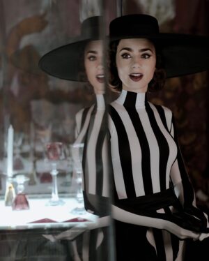 Lily Collins Instagram - A little commotion for the dress (...slash catsuit). Hands down my favorite costume from season four, designed by my dear friend, the one and only @harris_reed! Working with Harris, the @ninaricci team, and @marylin.fitoussi on this was an absolute dream collaboration. I knew from the moment I first read the script that it could only be made by Harris. Every detail was so intentional, inspired, and perfectly Emily. And of course, a huge thank you to my dream glam team @aureliepayenmakeup and @mikedesir for complimenting it with your insane talents and bringing the whole look to another level. I cannot thank you all enough for this magical moment…
