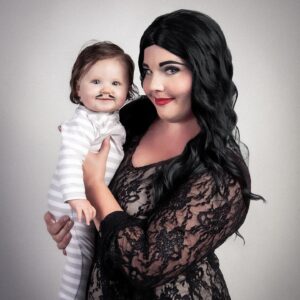 Lindsay Jones Instagram - "We went through all the usual baby names...then we came to our senses. Pubert." Thank you so much to @JonRisinger and @texasdelarosa for once again jumping on board with a fun mother/daughter Addams Family-inspired shoot and for making Pubert (Luna) Jones a reality! 🖤