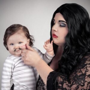 Lindsay Jones Instagram - "We went through all the usual baby names...then we came to our senses. Pubert." Thank you so much to @JonRisinger and @texasdelarosa for once again jumping on board with a fun mother/daughter Addams Family-inspired shoot and for making Pubert (Luna) Jones a reality! 🖤