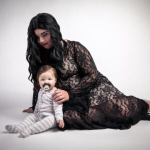Lindsay Jones Instagram - "We went through all the usual baby names...then we came to our senses. Pubert." Thank you so much to @JonRisinger and @texasdelarosa for once again jumping on board with a fun mother/daughter Addams Family-inspired shoot and for making Pubert (Luna) Jones a reality! 🖤