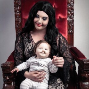 Lindsay Jones Instagram - "We went through all the usual baby names...then we came to our senses. Pubert." Thank you so much to @JonRisinger and @texasdelarosa for once again jumping on board with a fun mother/daughter Addams Family-inspired shoot and for making Pubert (Luna) Jones a reality! 🖤