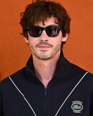 Logan Lerman Instagram - Merci @lacoste x @rolandgarros for making my unhealthy obsession with tennis even worse. Incredible wins for @carlitosalcarazz and @iga.swiatek 🏆 Carlitossssss!!!!!! 🇪🇸