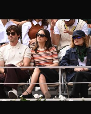 Logan Lerman Instagram - Merci @lacoste x @rolandgarros for making my unhealthy obsession with tennis even worse. Incredible wins for @carlitosalcarazz and @iga.swiatek 🏆 Carlitossssss!!!!!! 🇪🇸