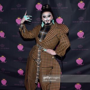 Loris Instagram - I paid $450 each for these images and then I re-added the watermark because I thought it made me look cool. 🤷‍♀️ 
The last slide is the face I make when I’m ordering at Taco Bell. This is not a sponsored #ad but it should be. 
Westwood inspired suit by me and @gummibaerlatex 😌
Attending the premiere of @eurekaohara music video “BIG MAWMA” ☺️
#loris #lorislatex #bigmawma #eureka #dragula #dragulatitans #dragrace #rpdr #rupaulsdragrace #allstars