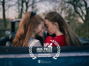 Louisa Connolly-Burnham Instagram - This is a really special one to us. We’re heading to BAFTA-qualifying @irisprize!! Thrilled to be nominated for “Best British Short Award” sponsored by @film4 & @pinewoodstudios including a year-long stint on @channel4 🏳️‍🌈

📷 @thomaselliotwood

CAST:

Kaidence: @louisaconnollyburnham 
Galilee: @mia_mbruce 
Jeremiah: @michaelcfox 
Eden: @darcywillisonsloan 
Virtue: @jadiehobson 
Lynlee: @_lisaoc 
Charity: @augusta.woods 
Warren: @kuhldietmar 

CREW:

Writer/Director: @louisaconnollyburnham 
Producers: @louisaconnollyburnham & @augusta.woods

Editor: @chloe.kilby 
Colourist: @imkarol.colour 
Composer: @jamesnewmusic 
Sound Design: @molinarepost

Re-recording Mixer: @lensound 
Dialogue Editor: @confusedrocker 
SFX Editor: @_kirsty.g 
Foley Artist: @zoekingfoley 
Foley Mixer: @chesca_bourne
ADR Mixer: @senorturtle
Music Mixer: @frankcolucci

DOP: @angelaneildop
1st AC: @robertshaw_oneword 
2nd AC: @ssuzanne_s 
Camera Operator: @meurig_dop 
Grips: @jay.grip @connorhartridge @thegripcompany 

First AD: @emilyjanesheppard 
Script Supervisor: @merrynrae 

Gaffer: @tclighting 
Spark: @christinealexander94 

Production Designer: @harrisonclark 

Stills: @thomaselliotwood 

Sound Mixer: @emilycomptonsound 
Boom Op: @india_holdstock 

Costume Designer: @conniejwoods 
Assistant Costume: @_.chloethomas_ 

Hair & Make-up Designer: @4th_storm 
HMU Assistant: @ellismckennabruce 

Intimacy Coordinator: @stellamoss 
IC Assistant: @rosefletch 

Medic: Peter Leggatt

VFX Artists:
@leew_vfx
@njglong 
@freiwasserfilm
@borsarinicola 

Production Assistants:

@rosefletch 
@lauren_carver_ 
@mollyvjones 
@elishamistretta 
@issycarr__ 
@tjmanders 

Production Companies: @thimblefilms @trackfilmsltd 

With: @firstflightspro @goldfinchuk 

Camera Kit: @focuscanning 

Lighting Kit: @pixipixeluk 

DCP: @ironboxstudios 

Executive Producers:

@emilyeverdee 
Dietmar Kuhl 
Nick Sadler
Kirsty Bell
Mia McKenna-Bruce 
Brian May
Bollie Lee Jarratt Jr. 
Shannon Prynoski
M. Sean Agnew
Anthony Burnham
Robert Hoffman
John Kelleher 
Pat Potter 
Owen Palmiotti
Elias Savada 
Kingsley Pilgrim 
Matthew J. Schroeder
Anne Burnham
Barry Vonk
Diana MacNeill Wegner
Lou Wegner 
Reno Anastasio 
Dywayne Thomas