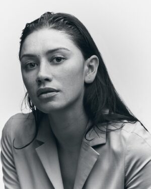 Luciane Buchanan Instagram - I met my neighbour about a month ago when our power went out. We were in full on crisis mode running around trying to figure it out - bloody New York shit 😂 Turns out he was paying my bill, I was paying the apartment across from us and they were paying his. It was a mess. Anyway, he’s such a talented photographer and we jammed the other day. I told him I HATE taking photos, and I turn up with boofy hair, no make up and a whole block Whitakers chocolate from home 😂 Thank you again for making me comfortable in front of the lens and these dope pics!!! @dimitrimais you’re the coolest 🤙🏽