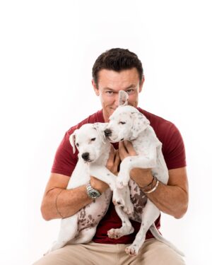 Luke Evans Instagram - The amazing work that @wagsandwalks do. One of these brothers has been adopted but one more is still looking for a forever home. They have so many beautiful doggies at @wagsandwalks looking for loving families. Go check them out. Oh! And enjoy my happy place #dogsofinstagram #adoptdontshop #doggie #puppy #puppylove 

Thank you @charlienunnphotography for making my day!