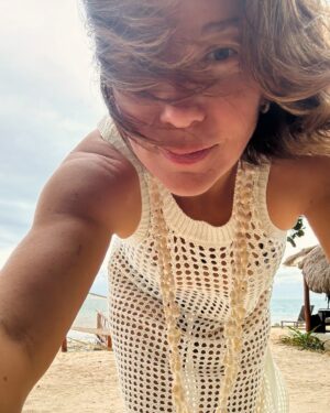 Lynn Collins Instagram - Happy Summer Solstice, Happy Full Moon, and Happy International Day of Yoga!! ☀️🌕🧘🏻‍♀️

…and a reminder to follow @thegoodwooportal and check out the new website link in bio! #thegoodwoo 

Thank you @solidandstriped for the rash guard top and @thesongbirdco for the body chain! 
#summersoltice #internationaldayofyoga #fullmoon #beach #islandlife #bikini