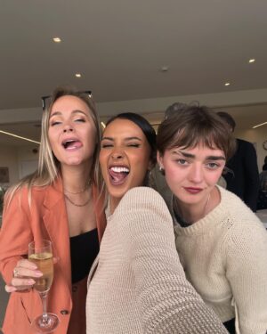 Maisie Williams Instagram - a love triangle between me, my dog, and my @peachyden cardigan x
