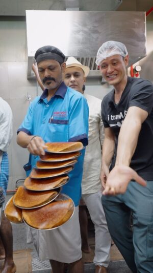 Mark Wiens Instagram - Legendary arm stack dosa in Bengaluru, India! 🇮🇳 The crunchy butter dosa is amazing. @kripalamanna 

📍 Vidyarthi Bhavan @vidyarthibhavan, #Bengaluru #India